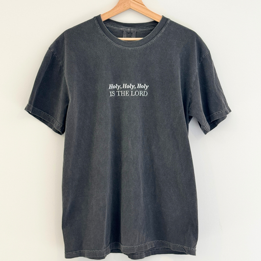 Black t-shirt with White embroidered 'Holy, Holy, Holy IS THE LORD' text on a white background