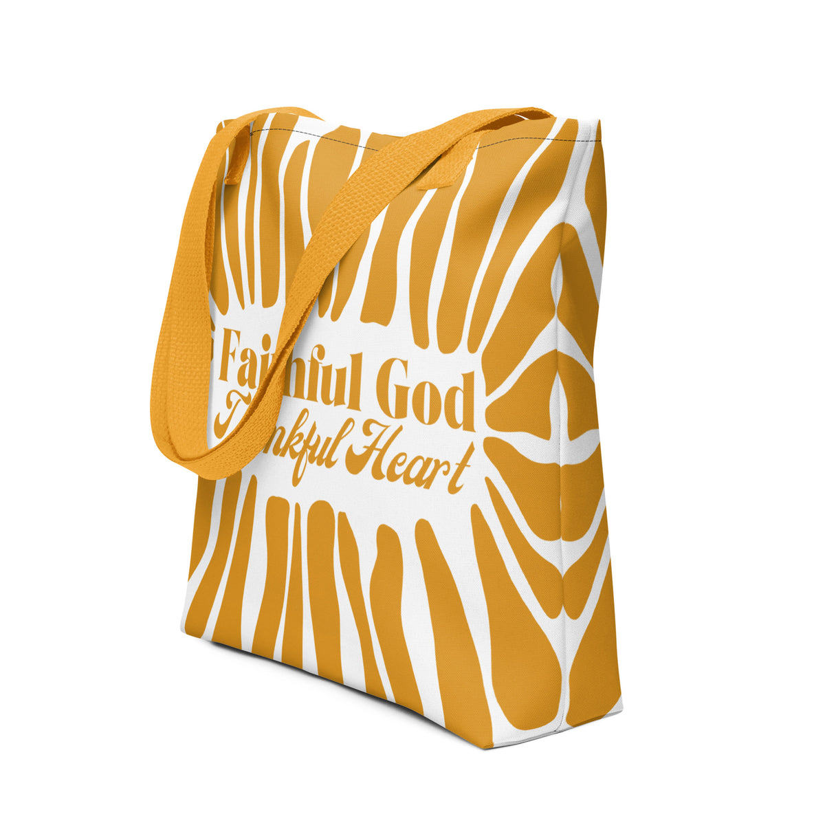 Tote bag with yellow and white design and 'FAITHFUL GOD, THANKFUL HEART' text.